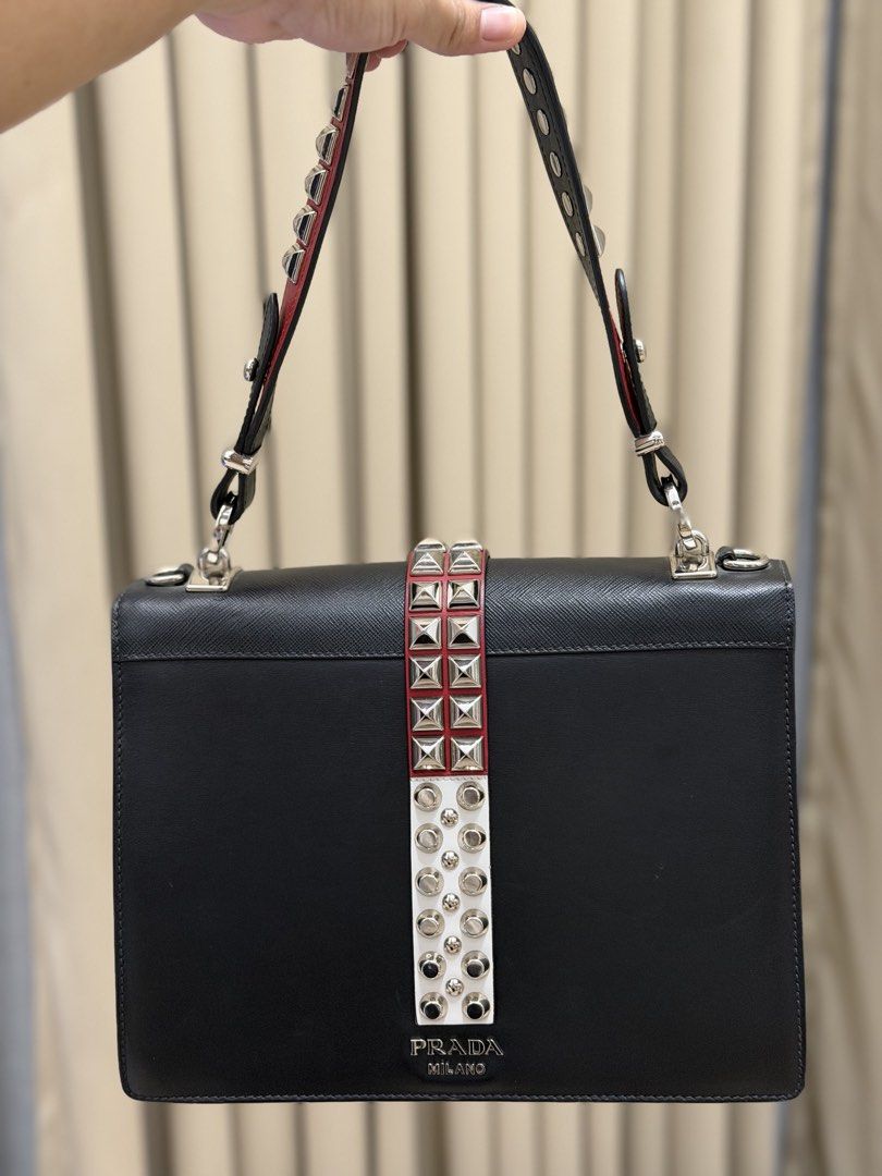 Authentic Prada Elektra Studded Shoulder Bag (Category: Shoulder Bags) located in Manila. Submitted by maria_2326 (Listing ID 1469353036, Image 3). Description: 💯% Authentic w/dust bag, booklet, prada authentication card, entrupy/COA Location: Manila/QC .