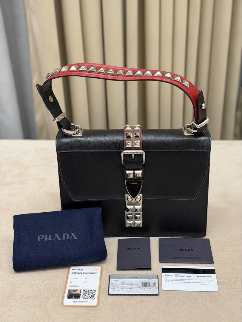 Authentic Prada Elektra Studded Shoulder Bag (Category: Shoulder Bags) located in Manila. Submitted by maria_2326 (Listing ID 1469353036, Image 1). Description: 💯% Authentic w/dust bag, booklet, prada authentication card, entrupy/COA Location: Manila/QC .
