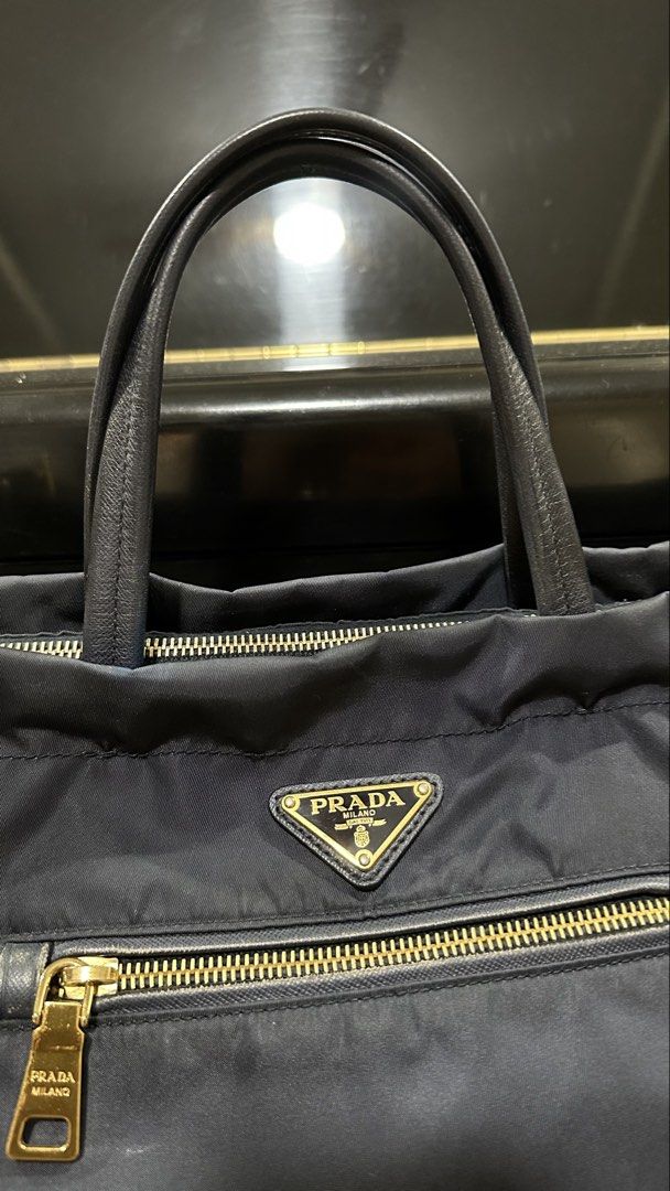 Authentic Prada Nylon Two Way (Category: Luxury Bags & Wallets) located in Las Pinas. Submitted by marshmallowmax (Listing ID 1469293578, Image 2). Description: Guaranteed Authentic! Slightly used, minimal signs of usage, no flaws. No more inclusions.
