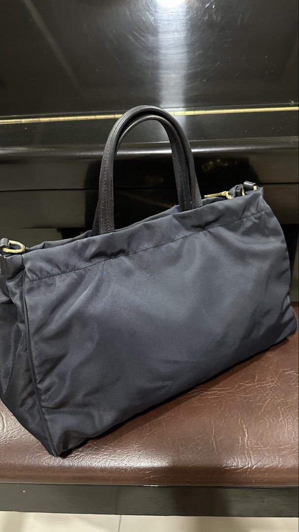 Authentic Prada Nylon Two Way (Category: Luxury Bags & Wallets) located in Las Pinas. Submitted by marshmallowmax (Listing ID 1469293578, Image 3). Description: Guaranteed Authentic! Slightly used, minimal signs of usage, no flaws. No more inclusions.