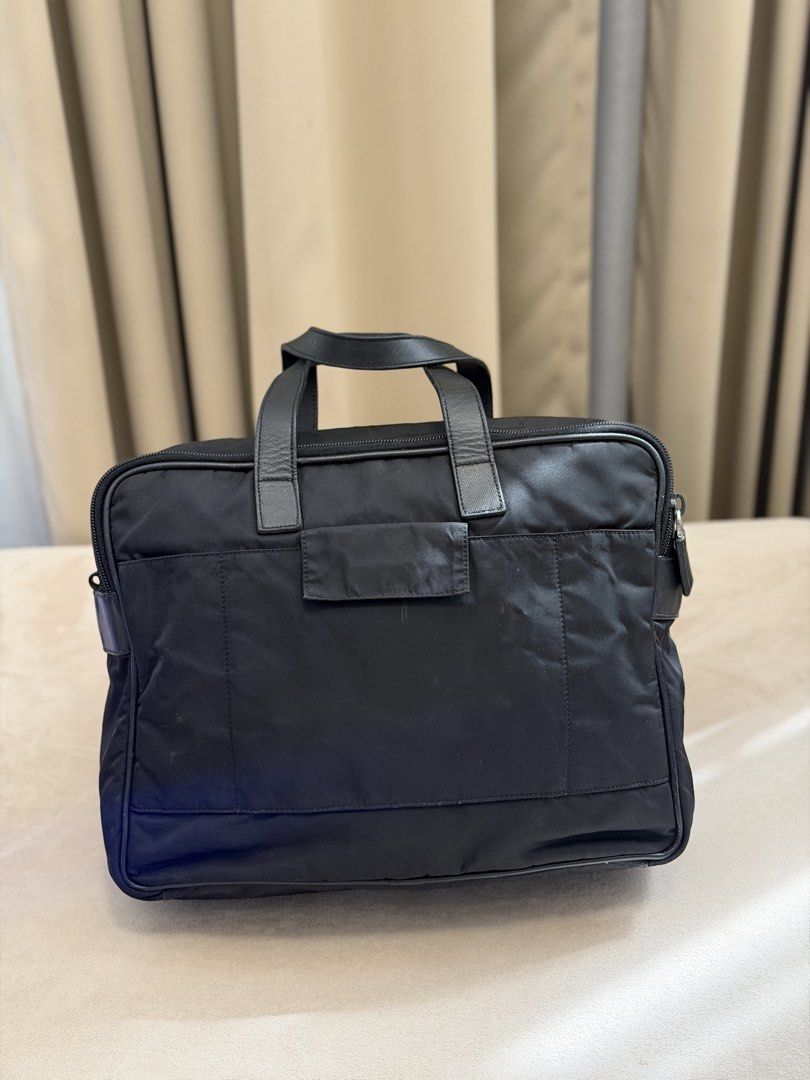Authentic Prada Tessuto Laptop Bag (Category: Briefcases) located in Manila. Submitted by maria_2326 (Listing ID 1469351033, Image 2). Description: 💯% Authentic | No inclusions Fits up to 15” laptop Location: Manila/QC.