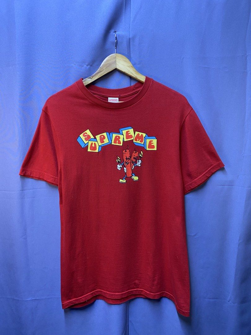 Authentic Supreme “Dynamite” Tee (Category: Tshirts & Polo Shirts ) located in Makati City. Submitted by drip.poww (Listing ID 1469344036, Image 1). Description: - Authentic Supreme - Color: Red - Size: Small - Dimes: 21x28 - Authentic - Baby hairline - Excellent condition - Need wash, fresh from bale - Material: 100% Cotton Please don’t expect too much—these are thrifted (ukay) items. 😊 !!STILL NEGOTIABLE!!.
