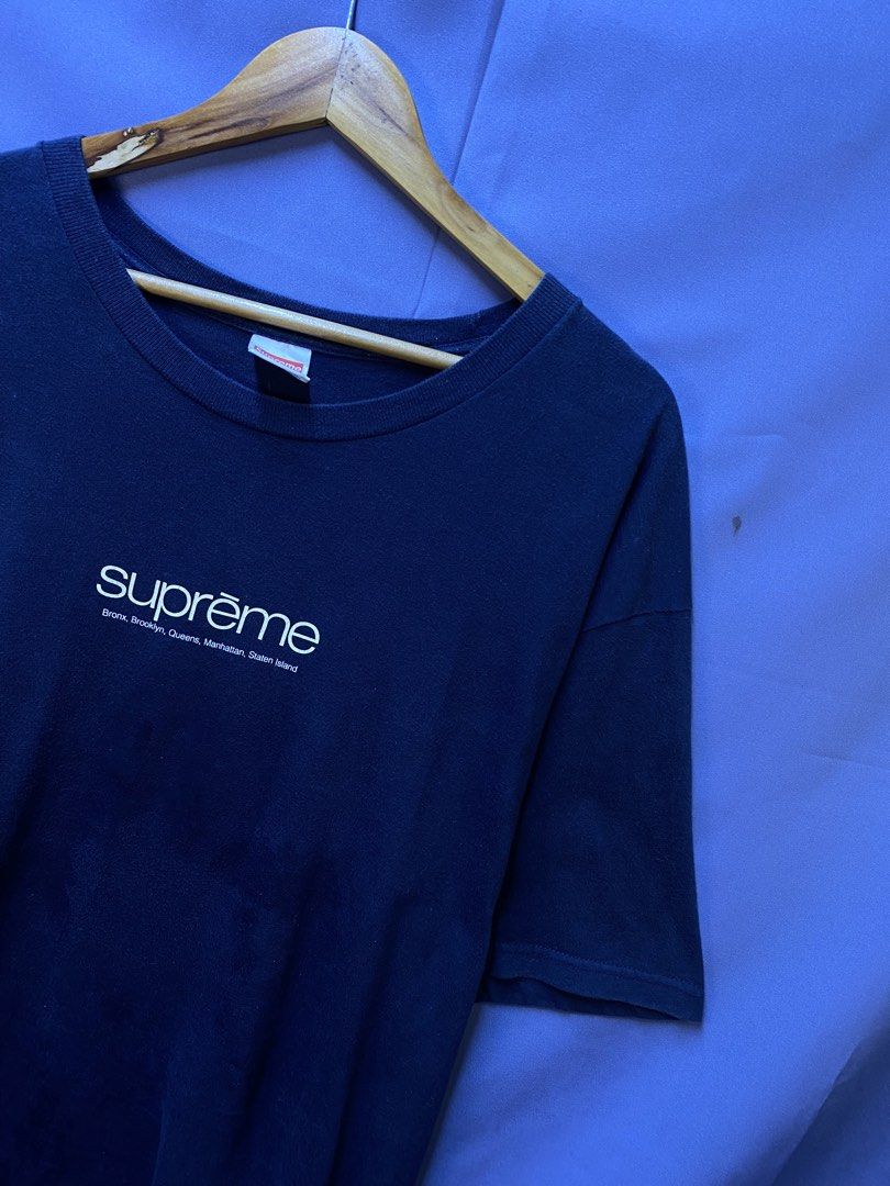 Authentic Supreme “Five Boroughs” Tee (Category: Tshirts & Polo Shirts ) located in Makati City. Submitted by drip.poww (Listing ID 1469340012, Image 2). Description: - Authentic Supreme - Color: Navy Blue - Size: XL - Dimes: 24x30 - Authentic - Excellent condition - Need wash, fresh from bale - Material: 100% Cotton Please don’t expect too much—these are thrifted (ukay) items. 😊 !!STILL NEGOTIABLE!!.