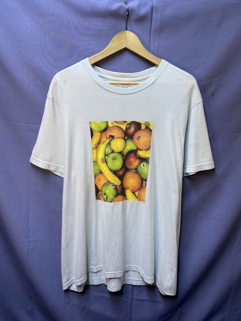 AUTHENTIC SUPREME “FRUIT TEE” (Category: Tshirts & Polo Shirts ) located in Makati City. Submitted by drip.poww (Listing ID 1469334334, Image 1). Description: - Authentic Supreme - Size: Large - Dimes: 22x29 - Authentic - Yellow stain need wash - Excellent condition - Need wash, fresh from bale - Material: 100% Cotton Please don’t expect too much—these are thrifted (ukay) items. 😊 !!STILL NEGOTIABLE!!.
