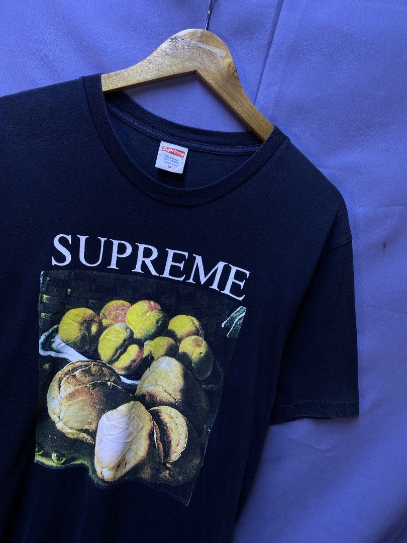 Authentic Supremme “still life” tee (Category: Tshirts & Polo Shirts ) located in Makati City. Submitted by drip.poww (Listing ID 1469338650, Image 2). Description: - Authentic Supreme - Color: Black - Size: Meduim - Dimes:20x28 - Authentic - Excellent condition - Need wash, fresh from bale - Material: 100% Cotton Please don’t expect too much—these are thrifted (ukay) items. 😊 !!STILL NEGOTIABLE!!.