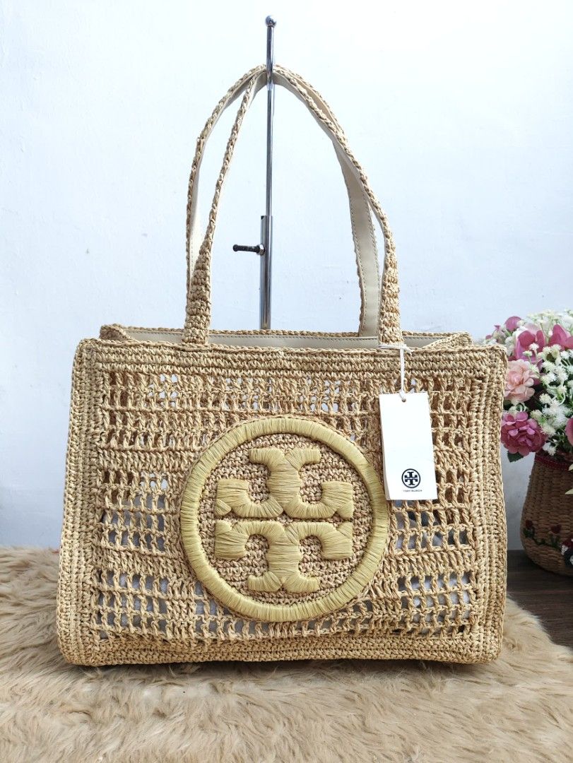 Authentic Tory Burch Ella raffia tote bag (Category: Tote Bags) located in Rizal. Submitted by hsiri1128 (Listing ID 1469303603, Image 1). Description: 📌From Japan Balikbayan box 💯✔️Legit CONDITION : 9/10 ISSUE / FLAWS : None. unused condition MATERIAL : raffia DETAILS : semi medium size. fit laptop up to 13 inch.