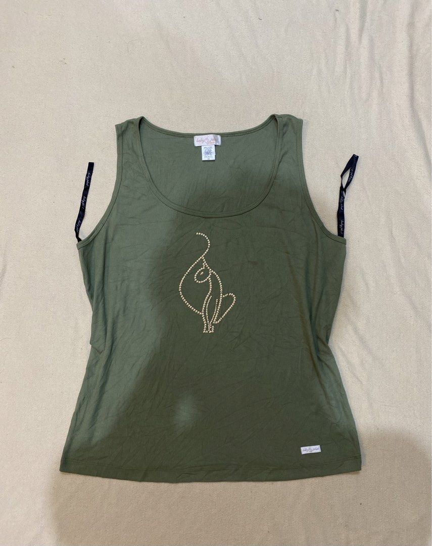 Baby phat top (Category: Sleeveless) located in Tanza. Submitted by 9th.street.thrift (Listing ID 1469165216, Image 1). Description: Baby phat top Good as new No issue Xl on tag 21.5x26.5 .