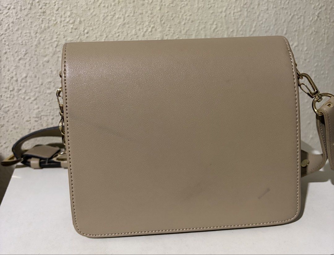 Bag to Basics Nora Shoulder Bag (Category: Cross-body Bags) located in Quezon City. Submitted by sarisaringdamit.dyg (Listing ID 1469325565, Image 3). Description: Bag to Basics Nora Shoulder Bag in a taupe or beige shade, made from vegan leather .