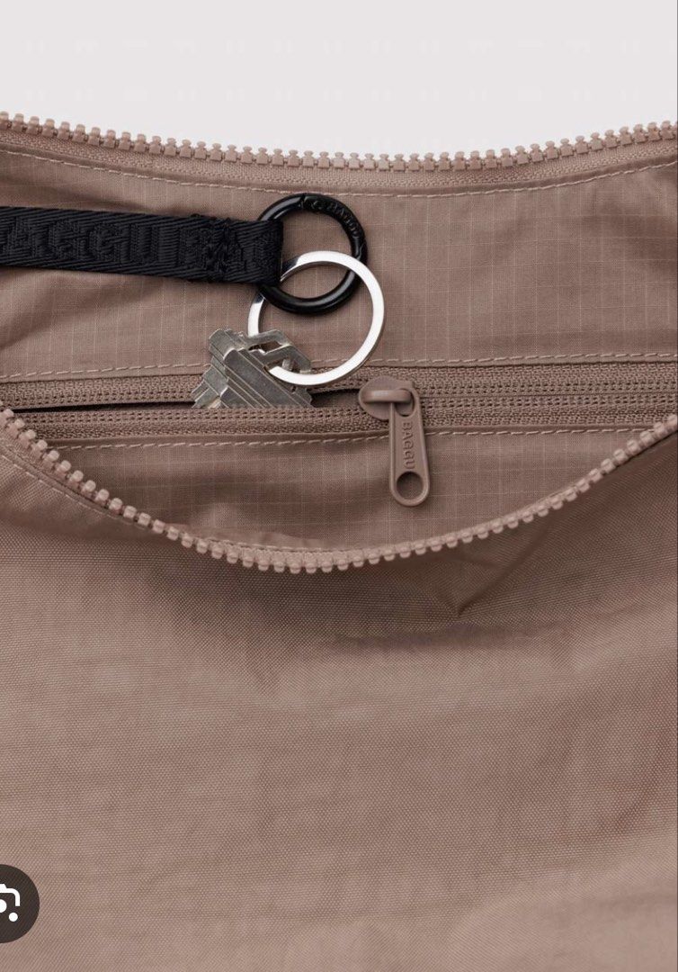 BAGGU Medium Crescent Bag (Category: Cross-body Bags) located in Digos. Submitted by millie.12 (Listing ID 1469229318, Image 2). Description: BAGGU bag Medium Crescent Bag Toasted Almond Color Brand new .