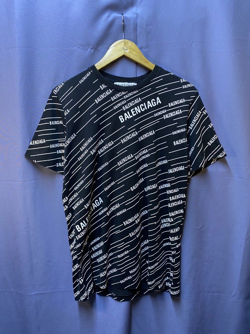 BALECIAGA “ALL OVER PRINT” (Category: Tshirts & Polo Shirts ) located in Makati City. Submitted by drip.poww (Listing ID 1469321846, Image 1). Description: - Balenciaga - Color: Black - Size: Black - Dimes: 20x27 - Authentic - Excellent condition - Need wash, fresh from bale - Material: 100% Cotton Please don’t expect too much—these are thrifted (ukay) items. 😊 !!STILL NEGOTIABLE!!.