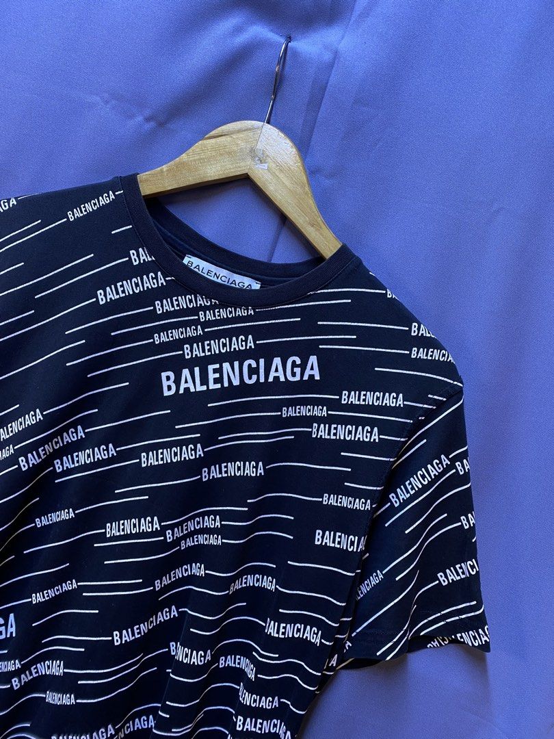BALECIAGA “ALL OVER PRINT” (Category: Tshirts & Polo Shirts ) located in Makati City. Submitted by drip.poww (Listing ID 1469321846, Image 2). Description: - Balenciaga - Color: Black - Size: Black - Dimes: 20x27 - Authentic - Excellent condition - Need wash, fresh from bale - Material: 100% Cotton Please don’t expect too much—these are thrifted (ukay) items. 😊 !!STILL NEGOTIABLE!!.