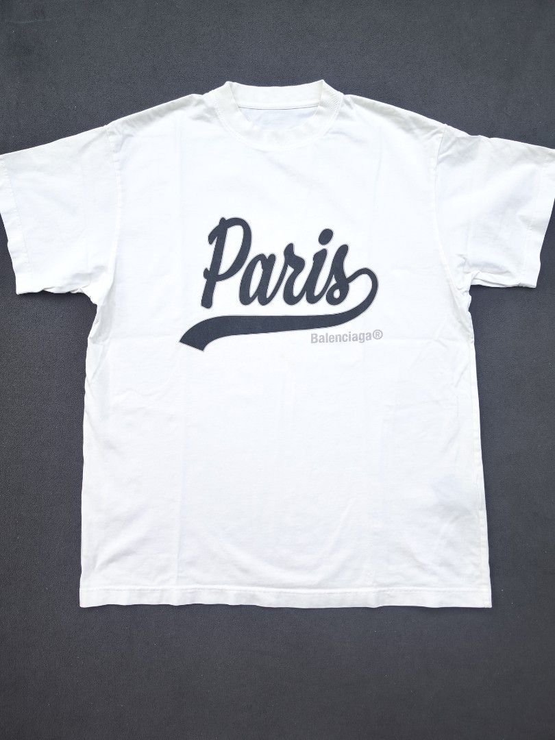 Balenciaga Paris Crew Neck Baseball Tee (Category: Luxury Apparel) located in Bulacan. Submitted by emilj23 (Listing ID 1469195778, Image 1). Description: Balenciaga Paris Crew Neck Baseball Tee Size S on tag L 29 W 22 Condition 9/10 Color rate 9/10 Issue Minimal Stain.