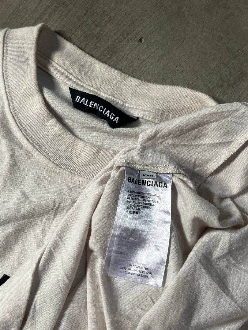 Balenciaga Sponso T-shirt (Category: Tshirts & Polo Shirts ) located in Polangui. Submitted by jamessaintlaurent (Listing ID 1469192187, Image 3). Description: This is a Balenciaga Sponsor Logo T-Shirt in an ivory or off-white colorway from the brand's Spring/Summer 2021 collection. W-23 L-29 SOME LINTS.