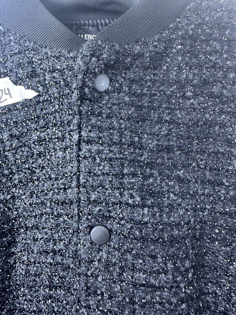 Balenciaga Textured Bomber Jacket Black Size M (Category: Coats, Jackets and Outerwear) located in Manila. Submitted by declutterpromax (Listing ID 1469215647, Image 2). Description: - Brand: Balenciaga - Style: Bomber jacket - Color: Black with solid dark trim - Size: Medium - Measurements: Approx. 22" x 25" x 24" - Details: Textured fabric, snap button closure, ribbed collar, cuffs, and hem - Condition: Clean, excellent, ready to wear - Perfect