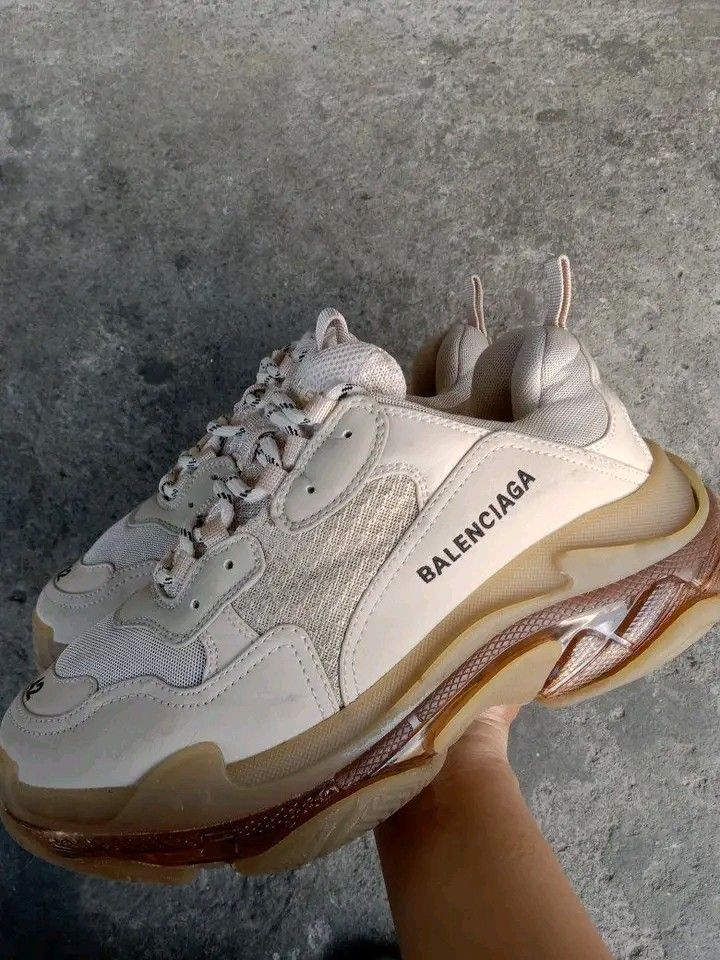 Balenciaga Triple s Chunky sneakers (Category: Sneakers) located in Koronadal. Submitted by joeannmahi28609 (Listing ID 1469168019, Image 2). Description: Balenciaga triple s chunky sneakers made in China size eur 42 for men only coded in goods condition ukay source sino bet nito gnda nito parang chocolate brown kulay nya mine nyo na.