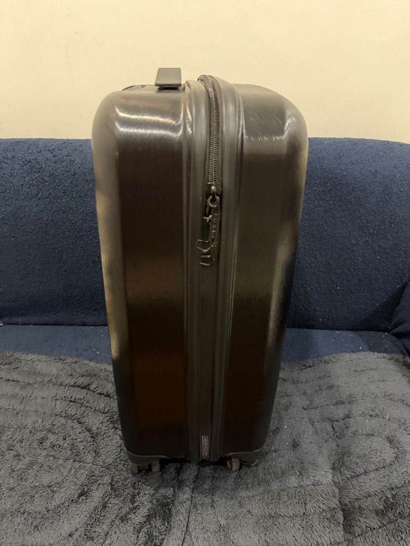 Balmain Luggage Suitcase Set Black (Category: Luggage) located in Caloocan City. Submitted by katewilson28573 (Listing ID 1469335926, Image 3). Description: - Authentic Balmain hard shell luggage set in sleek black - Includes two matching sizes with embossed logo lettering - Smooth spinner wheels and retractable handles for easy travel - Secure zip closures to keep belongings safe - Brand new with original store tags still attached.
