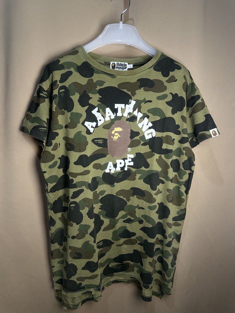 Bape 1st Camo Collage Tee (Category: Shirts) located in Marikina City. Submitted by swiftsian (Listing ID 1469175548, Image 1). Description: Authentic Bape 1st Camo Collage Tee - Size: Small (Women's) - Issue: None - Manage your expectations. Some issues may not be seen or indicated. - Color may vary due to lighting Shipping: Lalamove/J&T .