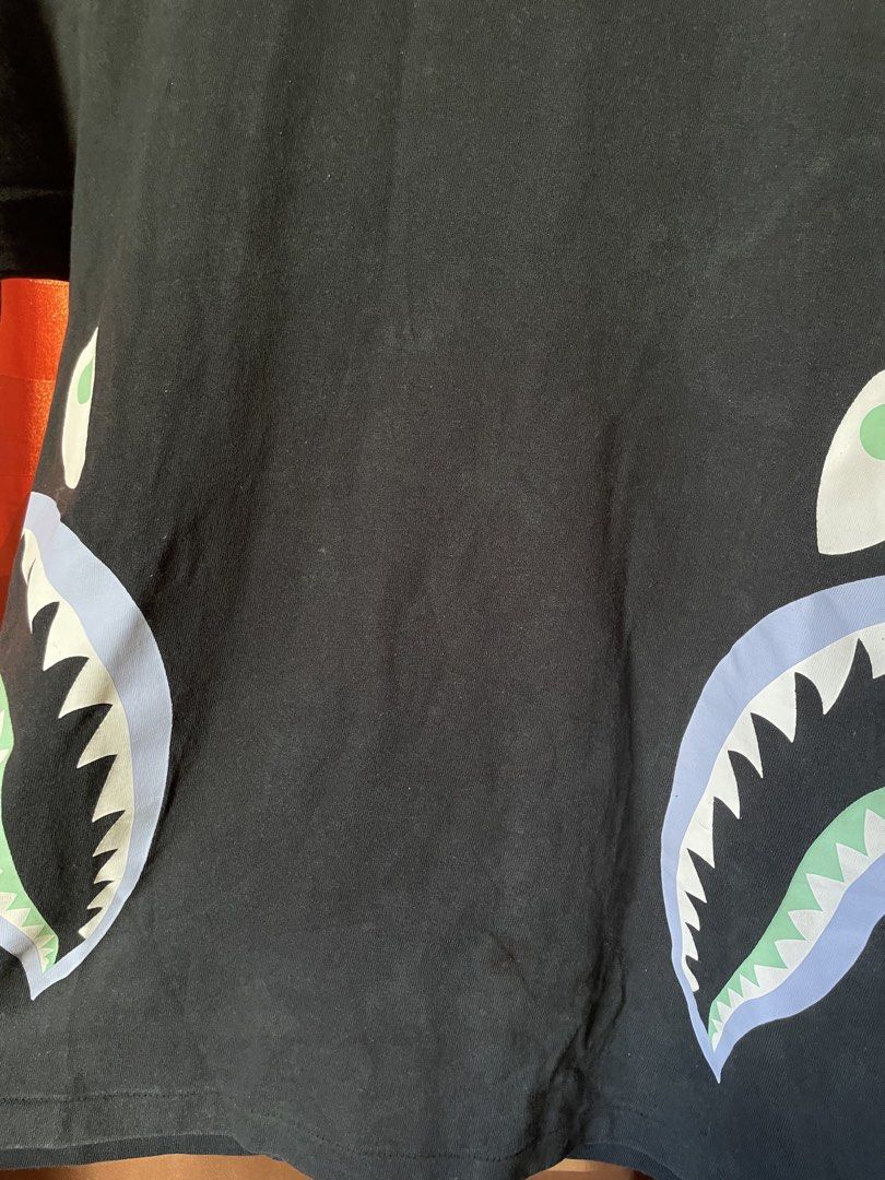 Bape glow in the dark side shark (Category: Tshirts & Polo Shirts ) located in Marikina City. Submitted by kaelnbellecloset (Listing ID 1469173916, Image 3). Description: Visible discoloration .