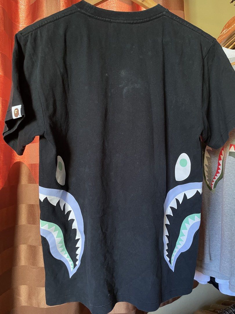 Bape glow in the dark side shark (Category: Tshirts & Polo Shirts ) located in Marikina City. Submitted by kaelnbellecloset (Listing ID 1469173916, Image 2). Description: Visible discoloration .
