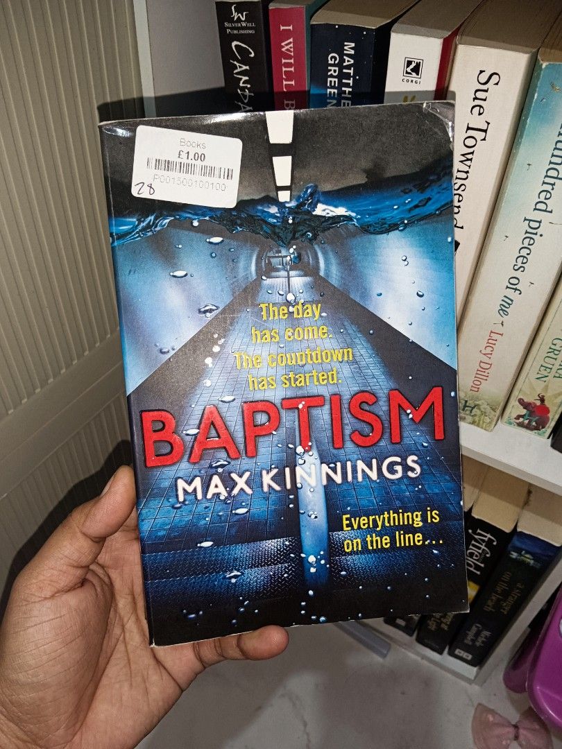 Baptism by Max Kinnings Paperback Novel (Category: Storybooks) located in Manila. Submitted by rosareads (Listing ID 1469257403, Image 1). Description: - Title: Baptism by Max Kinnings - Genre: Crime fiction / Fast-paced thriller - Format: Pre-owned paperback with glossy cover art - Condition: Good readable condition, features an old price sticker from a charity shop/bookstore on the top left corner - Plot: Suspenseful story featuring a thrilling