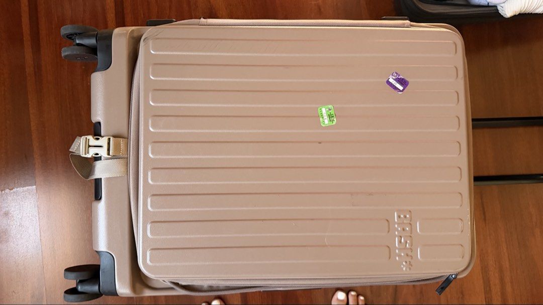 BASH Luggage in Oak (Category: Luggage) located in Pasig City. Submitted by usttiger (Listing ID 1469392718, Image 3). Description: Brand: BASH Hardside Luggage - Comes in a box and cover pa :) - Color: Oak - Condition: Used a few times, very sturdy, works superbly! Bought for: ₱6,995 Selling for: ₱4,890 :) - Features: - Front-opening zip compartment for quick access - Telescopic handle and side handle - Smooth spinner wheels - Built-in TSA combi