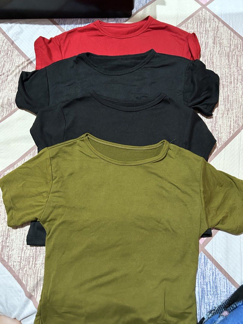 Basic Casual T-Shirts Pack Assorted Colors (Category: Shirts) located in Quezon City. Submitted by machristin03081 (Listing ID 1469213389, Image 1). Description: - Bundle of 4 basic short sleeve t-shirts - Colors: Red, 2x Black, and Olive Green - Classic crew neck design - double lining - Versatile everyday essentials, easy to pair with jeans or shorts - 200 take all only.