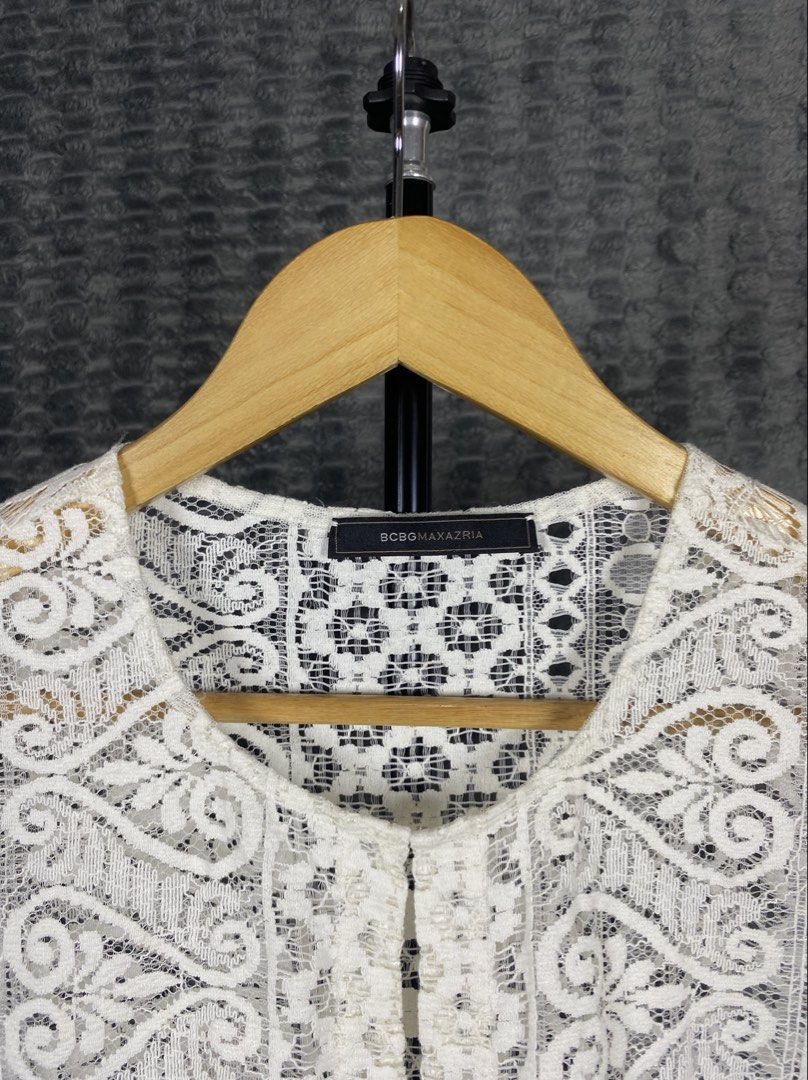 BCBG Maxazria Lace Overlay Top (Category: Blouses) located in Bacolod City. Submitted by treasurehunts.6100 (Listing ID 1469197647, Image 3). Description: BCBG Maxazria Lace Overlay Top Condition - Excellent Color - White Color rate - 9.8 / 10 No Flaws Size Dimensions : Width - 18.5 Length - 27 Brands you might find on my profile : ( Cos, Uniqlo, H&M, Zara, Muji, Ralph Lauren, Hugo Boss, Fred Perry, Lacoste, Armani, Oakley, The North Face, Lulule