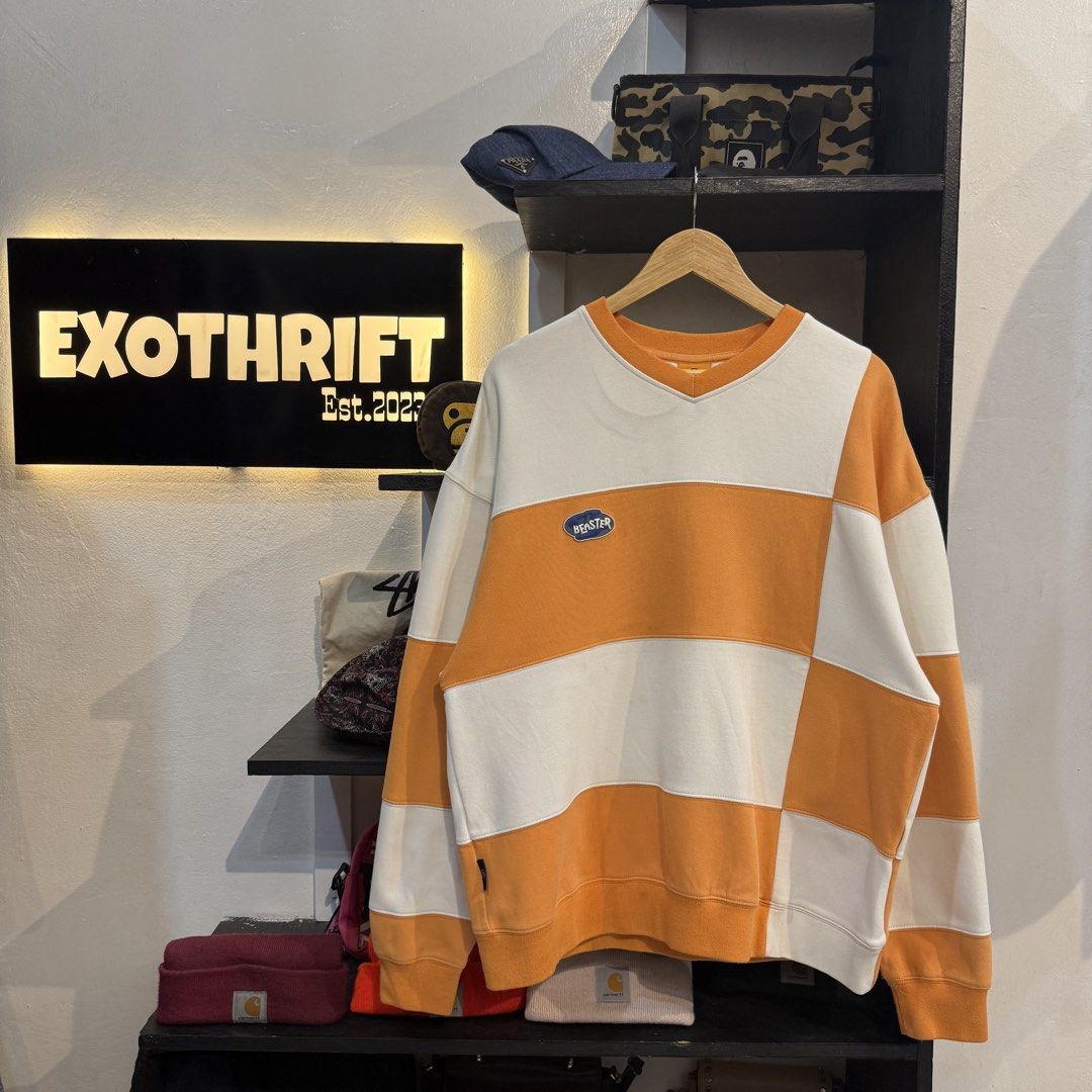 Beaster Colorblock V-Neck Sweatshirt Orange White (Category: Coats, Jackets and Outerwear) located in Manila. Submitted by carbungcoalex (Listing ID 1469336096, Image 1). Description: BEASTER TWOTONE SWEATSHIRT 23 by 27 Good Condition Complete tags Need wash 1200 CLAIM.