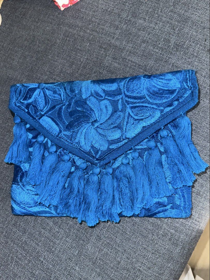 Beautiful Blue Bag (Category: Luxury Bags & Wallets) located in Makati City. Submitted by lavishlux (Listing ID 1469234117, Image 1). Description: Beautiful embroidered blue bag with tassel design - from Mexico There’s also a black sling so you could use as a bag or as a clutch 💙.