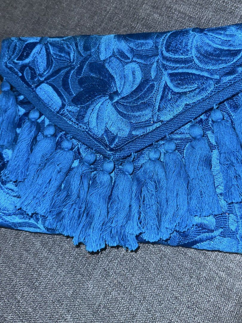 Beautiful Blue Bag (Category: Luxury Bags & Wallets) located in Makati City. Submitted by lavishlux (Listing ID 1469234117, Image 2). Description: Beautiful embroidered blue bag with tassel design - from Mexico There’s also a black sling so you could use as a bag or as a clutch 💙.
