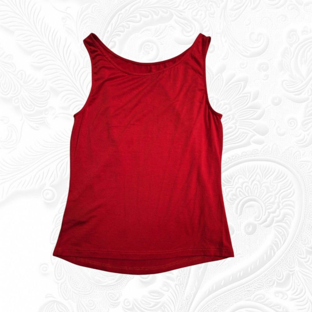 bebe Addiction Red Tank Top Size M (Category: Sleeveless) located in Paranaque City. Submitted by calm_youngstore7 (Listing ID 1469320028, Image 2). Description: - Brand: bebe Addiction - Color: Bright Red - Size: Medium - Material: Soft and stretchy fabric - Design: Classic scoop neckline on front and back - Origin: Made in USA - Condition: Great basic for layering or wearing on its own.