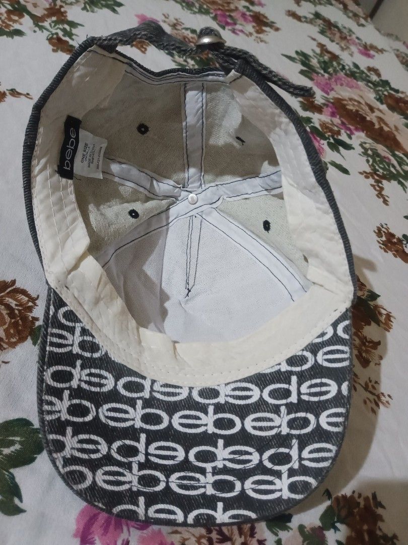 Bebe Rhinestone Logo Denim Baseball Cap (Category: Activewear) located in San Pablo. Submitted by halloweenxx (Listing ID 1469348687, Image 3). Description: - Authentic Bebe dark grey wash denim cap - Sparkling rhinestone logo across the front - Repeating Bebe logo pattern printed all over the under brim - Adjustable metal strap closure in the back - One size fits most - Clean inside and out, ready to wear hearing offers for this bebe rhinestones