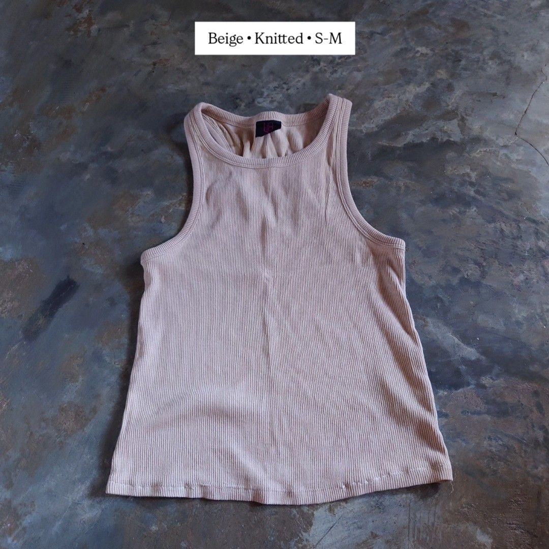 Beige Knitted Ribbed Tank Top S-M (Category: Sleeveless) located in Diffun. Submitted by declutteredbyJill (Listing ID 1469238061, Image 1). Description: - Color: Beige - Material: Stretchy ribbed knit - Style: Sleeveless with a round neckline - Fit: Small to medium frames - Condition: Excellent, clean inner label - Easy to pair with shorts or jeans.