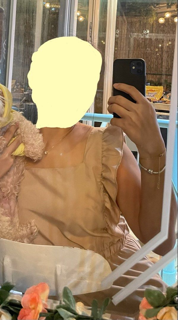 Beige sleeveless ruffled dress (Category: Dresses) located in Agdangan. Submitted by happyphoenix.d92869 (Listing ID 1469213655, Image 1). Description: - Color: Beige - Style: Sleeveless dress with square neckline and ruffled shoulder straps - Fit: Gathered waist detail for a flattering silhouette - Fabric: Light and comfortable, great for casual wear or dressing up - Condition: Excellent, worn only once for a quick photo, no flaws.