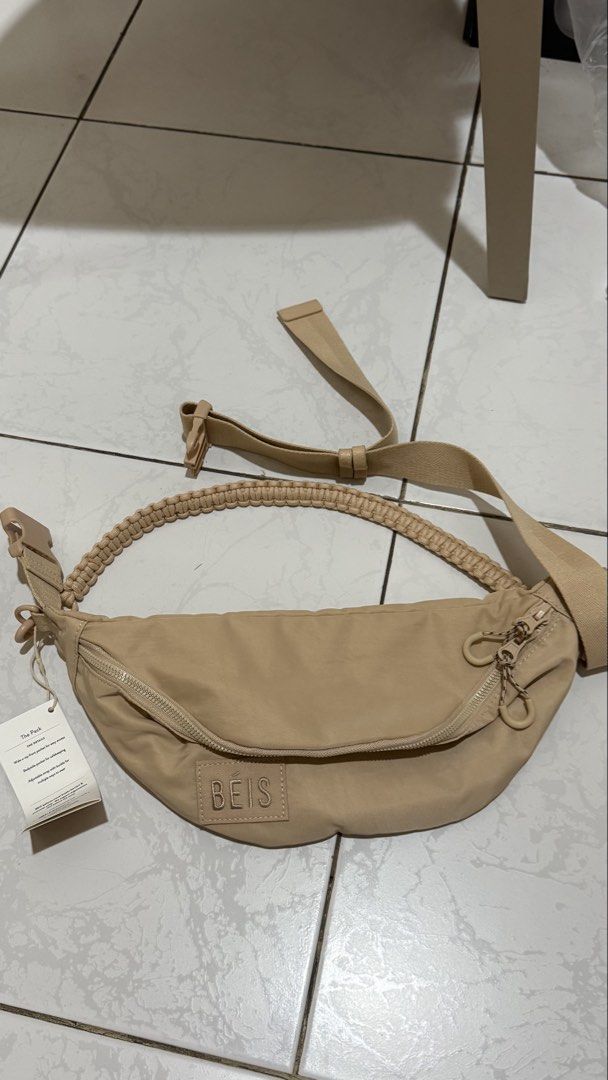 Belt Bag Beige (Category: Cross-body Bags) located in Makati City. Submitted by angel.ad (Listing ID 1469162992, Image 1). Description: Beige belt bag/waist pack Good condition, new Ideal for everyday use, travel, airport bag.