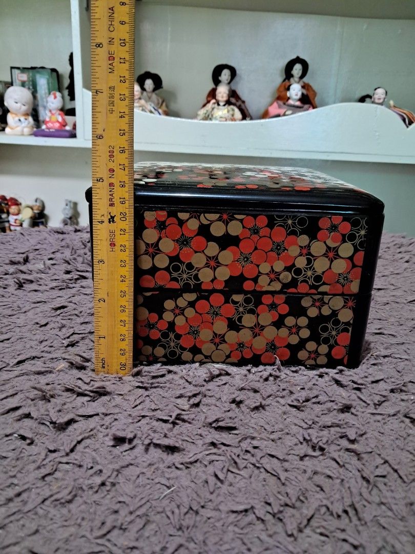 Bento box (Category: Food Organization & Storage) located in Cavite. Submitted by secretjapansurplus (Listing ID 1469221040, Image 2). Description: • Condition: Brand New Old Stock (BNOS). The lacquer finish retains its brilliant showroom shine, and the interior and exterior are completely clean with no chips or cracks. The original outer cardboard box shows minor signs of shelf and storage wear due to its age, adding to its genuine vintage charm