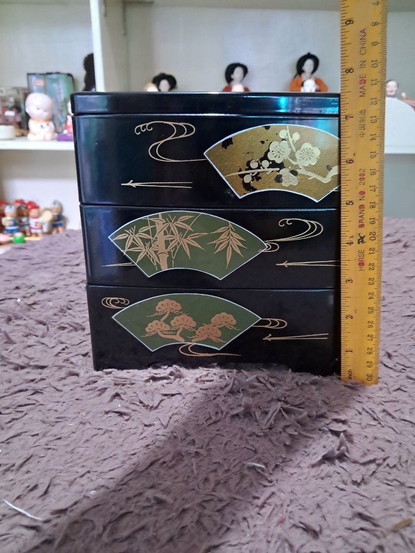 Bento box (Category: Food Organization & Storage) located in Cavite. Submitted by secretjapansurplus (Listing ID 1469224476, Image 2). Description: Condition: Brand New / Never Used (The item itself is pristine and unused, but please note that the outer cardboard box shows wear, aging, and cosmetic damage from long-term storage). Bring the elegance of traditional Japanese craftsmanship to your table with this beautiful 3-tier lacquerware jubako. 