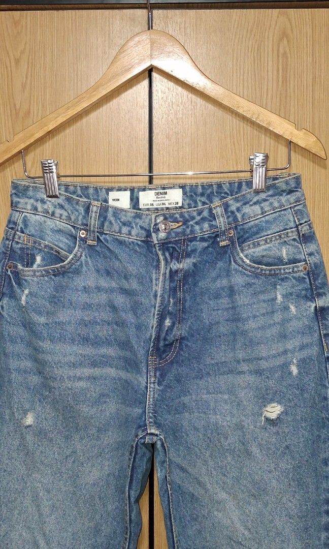 Bershka Mom Fit Jeans (Category: Jeans) located in Cebu City. Submitted by cebuanamomshies (Listing ID 1469321425, Image 3). Description: Waist 30-31 Rise 12 Inseam 27 High-rise Blue Denim Tapered Relaxed Fit zip and button closure.
