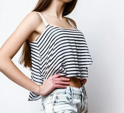 Bershka Striped Crop Top (Category: Shirts) located in Paranaque City. Submitted by calm_youngstore7 (Listing ID 1469284689, Image 1). Description: LAST PIECE SALE! - Brand: Bershka - Size: Medium - Condition: Brand new with tags (BNWT), never worn - Design: Black and white horizontal stripes, spaghetti straps - Material: Lightweight, flowy layered sheer fabric - Perfect for: Warm weather or stylish layering.