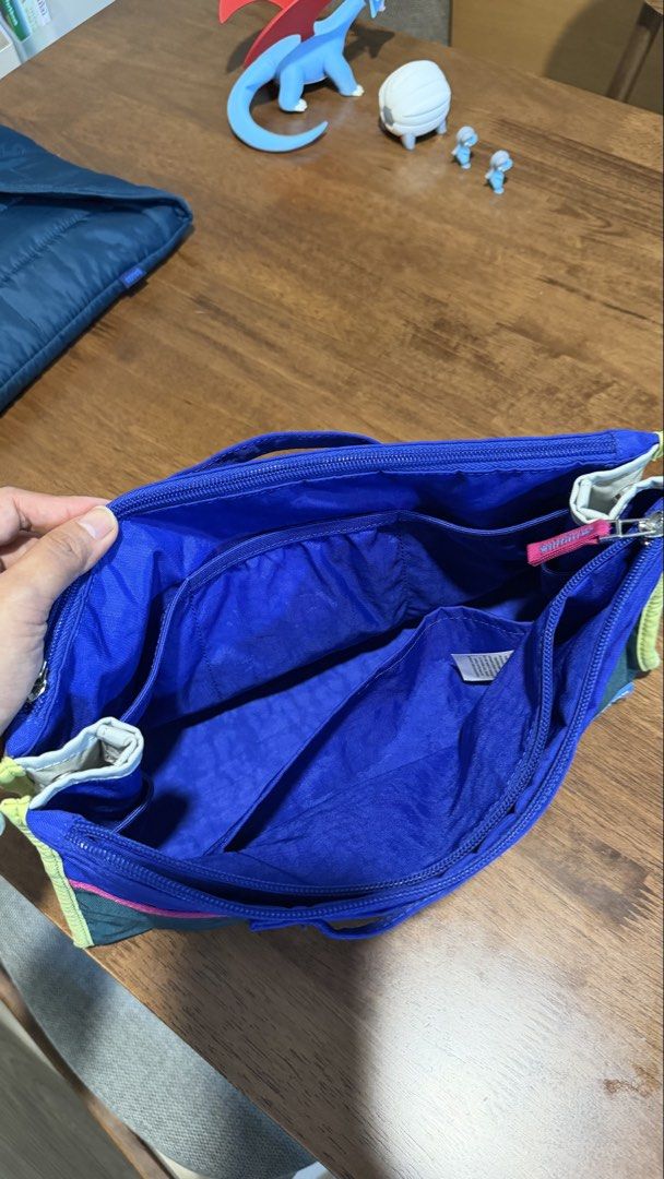 Beyond The Vines Multi-Color Bag Organizer (Category: Luxury Bags & Wallets) located in Mandaluyong City. Submitted by tidyingupnow (Listing ID 1469236117, Image 2). Description: - Brand: Beyond The Vines - Colors: Blue, Dark Green, Pink - Closure & Handling: Secure zip top closure with convenient grab handles - Storage: Multiple interior and exterior pockets for hassle-free sorting - Material: Lightweight fabric structure that adds no extra bulk