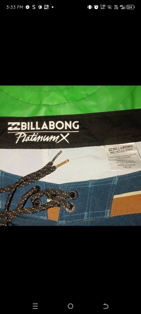 Billabong Platinum X (Category: Swim Trunks & Board Shorts) located in Mandaue City. Submitted by oceacasini96558 (Listing ID 1469228939, Image 3). Description: - Brand: Billabong Platinum X (Recycler Series) - Size: 34 - Material: 89% recycled polyester, 11% elastane (eco-friendly stretch fabric) - Design: Teal top with brown/white waist stripes and ocean wave print on lower half - Features: Secure drawstring closure, single back pocket with but