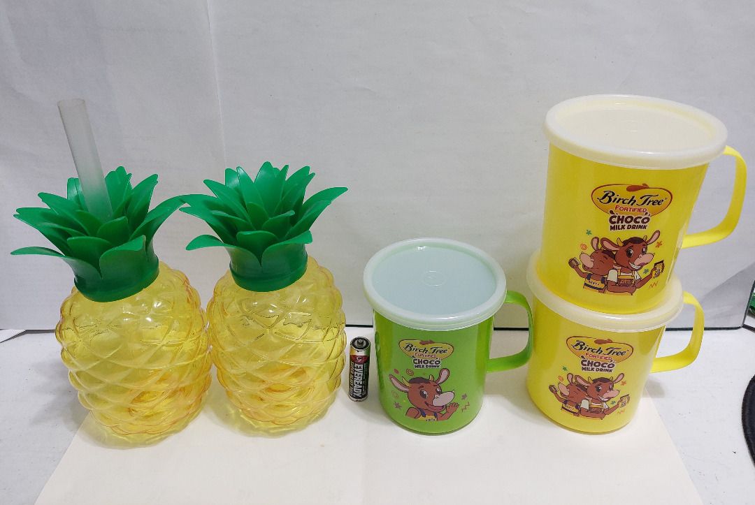 Drinking Cups and Pineapple Bottles Set of 5 (Category: Water Bottles & Tumblers) located in San Juan City. Submitted by linlgoldfish (Listing ID 1469176366, Image 2). Description: Drinking Cups & Pineapple Bottles • New. Unused. Good condition • Birch Tree cup - made by Sunny Ware • Pineapple drinking bottle - straw not included • What you see is what you get • RFS: decluttering .
