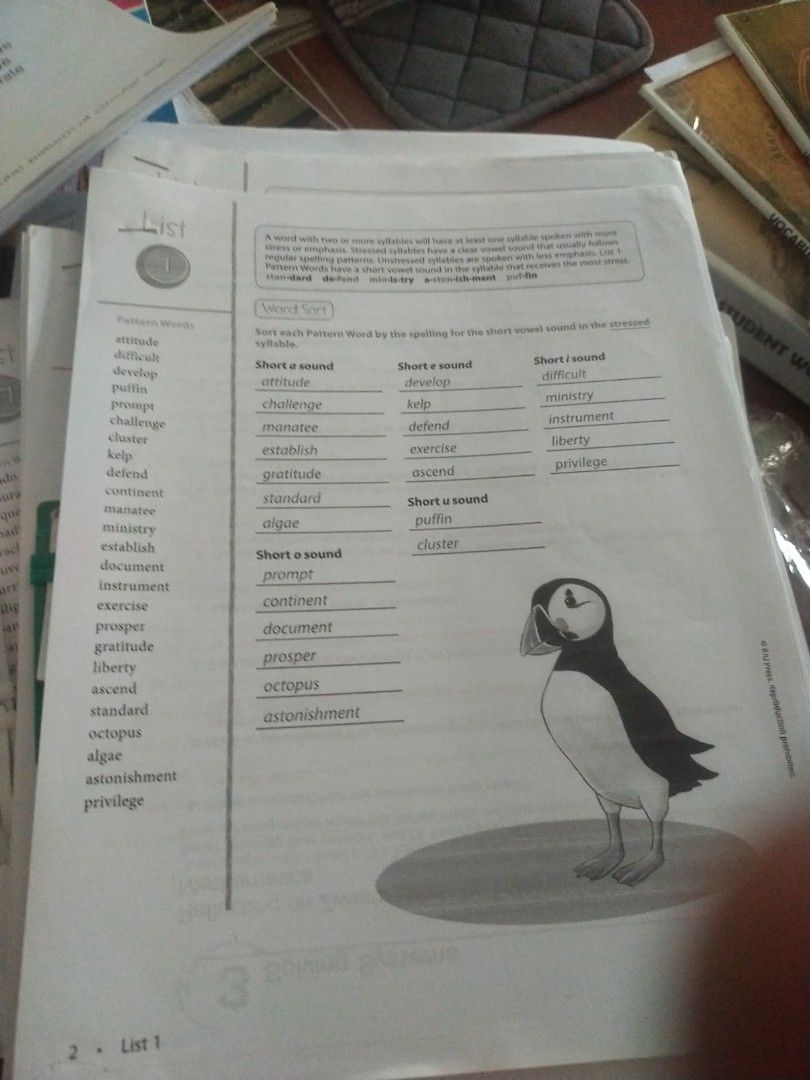 BJU Speling 6 answer and Worksheet answer (Category: Children's Books) located in Quezon City. Submitted by bamberry (Listing ID 1469208766, Image 1). Description: - Title: Word Sort Worksheet (List 1) - Focus: Short vowel sounds in stressed syllables (e.g., attitude, challenge, puffin) - Condition: Printed text with handwritten answers already filled in - Details: Page 2 at the bottom left, with an illustration of a puffin on the bottom right - 