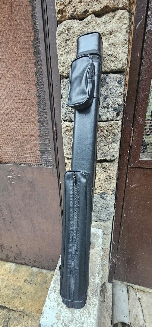 Black 2x4 Pool Cue Hard Case (Category: Billiards and Bowling) located in Manila. Submitted by joanahoohnana (Listing ID 1469202783, Image 1). Description: - Capacity: Holds 2 butts and 4 shafts securely - Protection: Padded interior safeguards against knocks and drops - Storage: 2 exterior zip pockets for chalk, tips, and small accessories - Durability: Heavy-duty, smooth-gliding zippers - Material: Easy-to-clean synthetic leather exterior - Ide