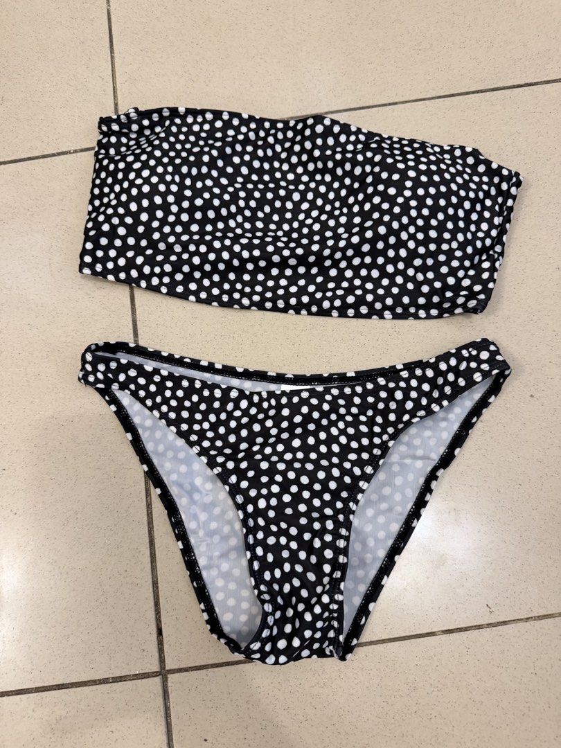 Black and White Polka Dot Two Piece Bikini (Category: Bikinis & Swimsuits) located in Pasig City. Submitted by miss_abuelita (Listing ID 1469237176, Image 3). Description: - Style: Bandeau top with matching low-rise bottoms - Design: Classic black with white polka dots - Material: Stretchy, unlined fabric - Perfect for: Beach days, pool hangs, and vacations - Condition: Brand new/Mint.