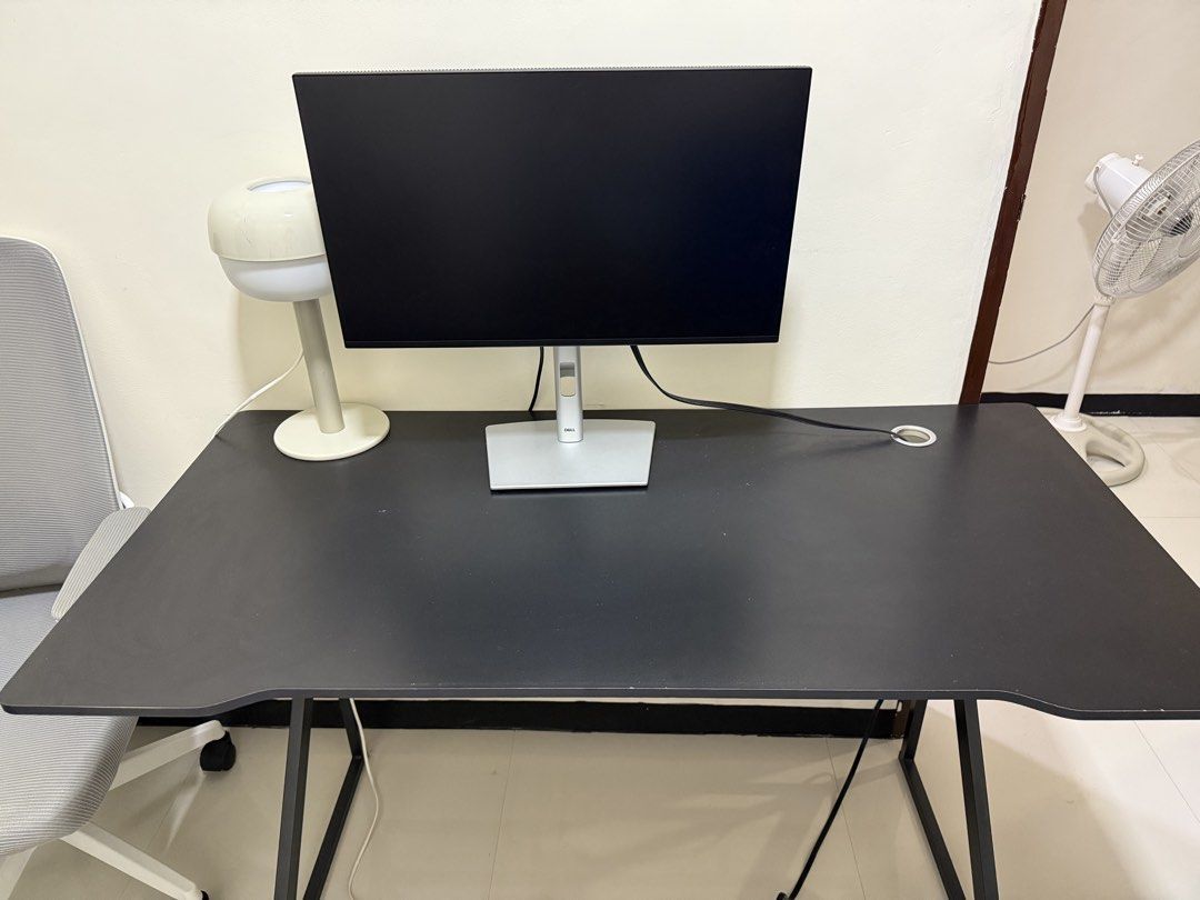 Black Computer Desk with Metal Z-Frame (Category: Office Furniture & Fixtures) located in Manila. Submitted by jooliyen (Listing ID 1469279401, Image 3). Description: - Color: Black -DIMENSION/SUKAT: (120cm x 60cm) - Frame: Sturdy metal Z-shaped legs for maximum stability - Features: Built-in cable management grommet hole - Condition: Smooth tabletop with minor edge wear from normal use - Ideal for: Work-from-home setups, dual monitors, or gaming