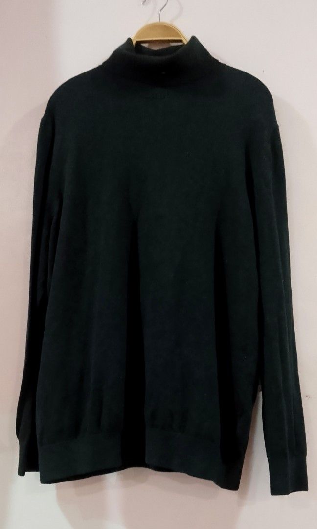Black fine-knit turtleneck sweater from H&M (Category: Formal Shirts) located in Cabanatuan. Submitted by miss.maia (Listing ID 1469300683, Image 3). Description: Black fine-knit turtleneck sweater from H&M, a versatile wardrobe staple featuring a classic folded high neckline, regular fit construction, and subtly ribbed cuffs and hemline..