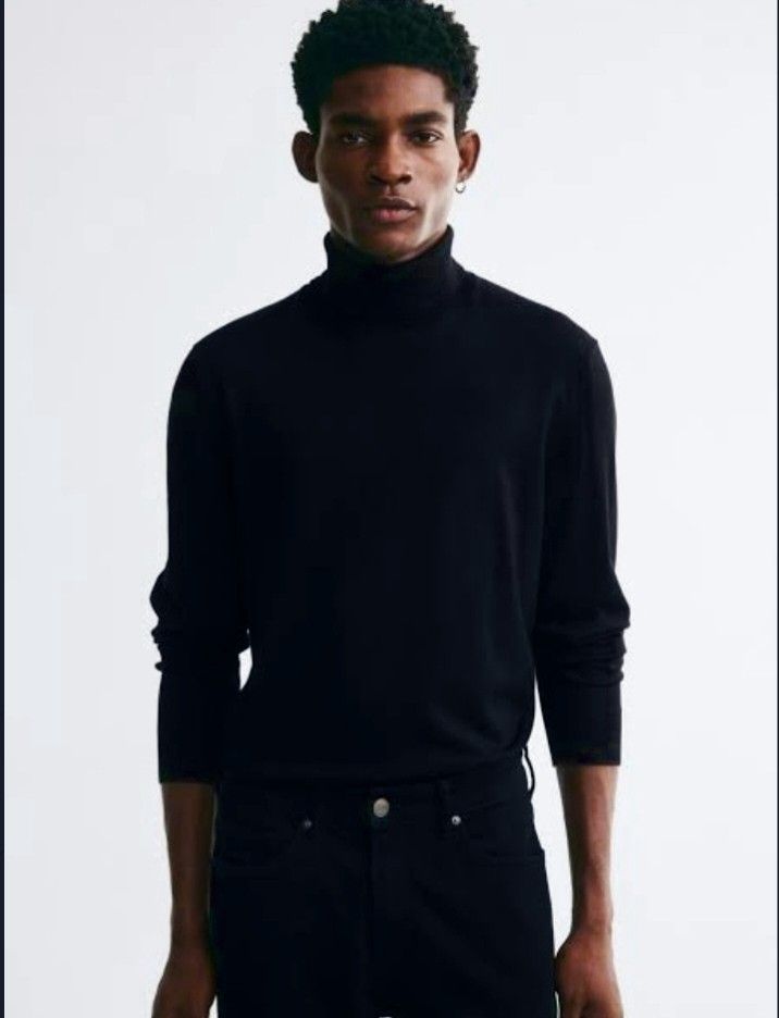 Black fine-knit turtleneck sweater from H&M (Category: Formal Shirts) located in Cabanatuan. Submitted by miss.maia (Listing ID 1469300683, Image 1). Description: Black fine-knit turtleneck sweater from H&M, a versatile wardrobe staple featuring a classic folded high neckline, regular fit construction, and subtly ribbed cuffs and hemline..