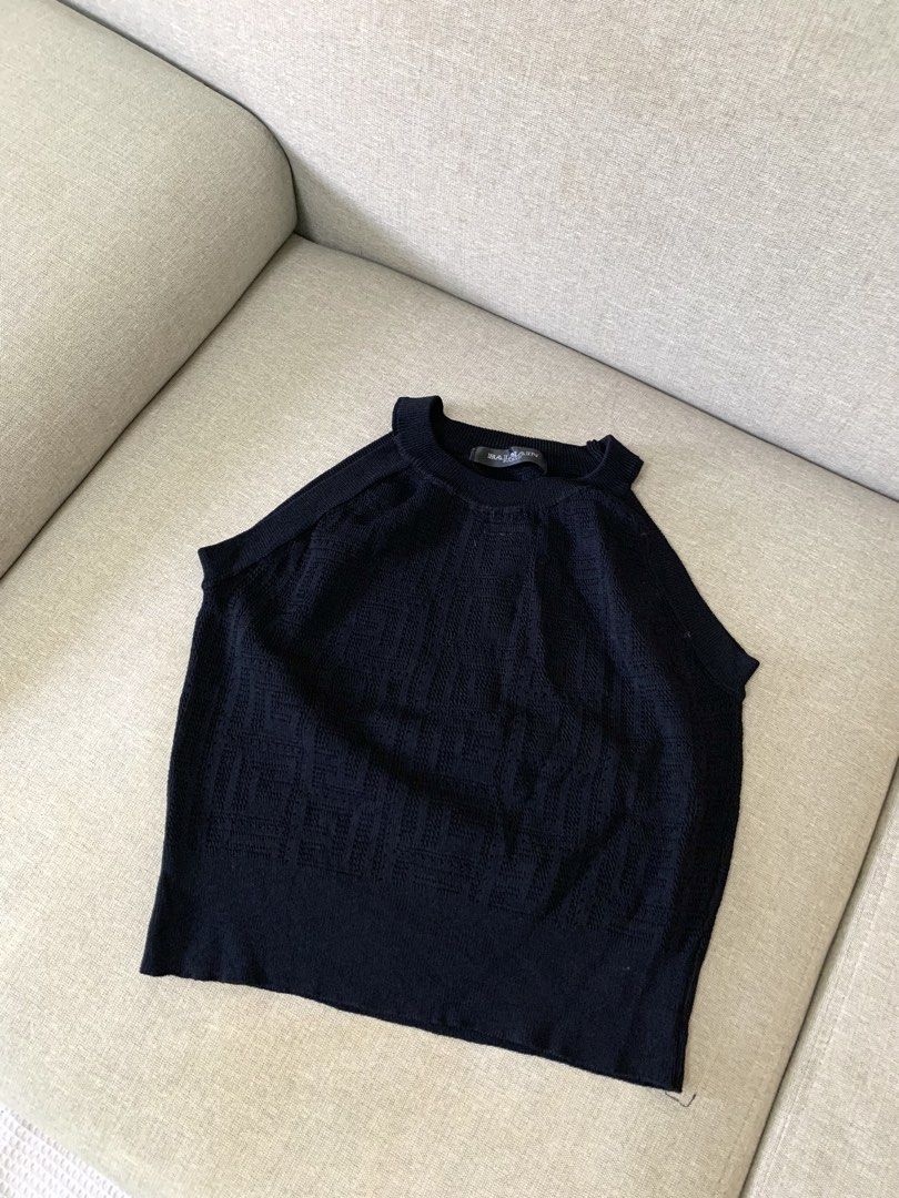 Black knitted tank top (Category: Sleeveless) located in Paranaque City. Submitted by shoplovedbya (Listing ID 1469269251, Image 1). Description: ♡ Size: Small- Large ♡ Bust: stretch up to 36 ♡ Length: 16.5 .