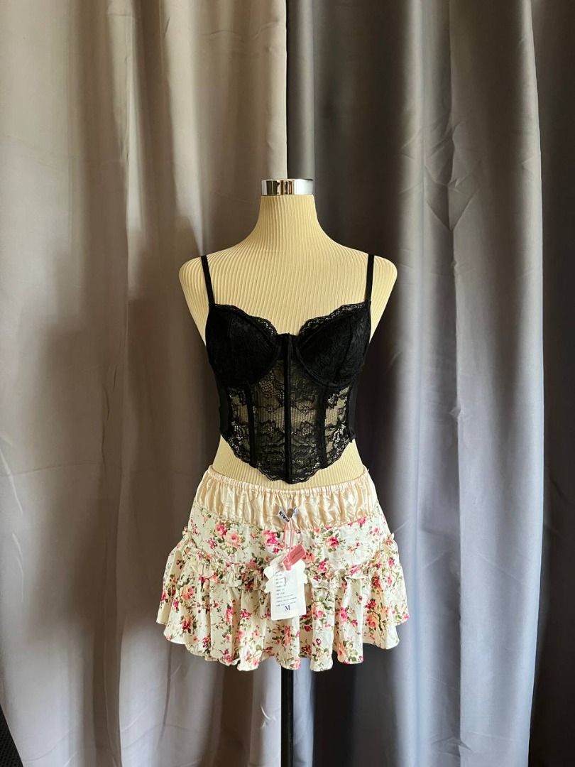Black Lace Corset Top (Category: Sleeveless) located in Cagayan de Oro. Submitted by curated_closetph (Listing ID 1469288877, Image 1). Description: — Size: XS - S — Color: Black — Sheer floral lace and mesh panels — Adjustable cami shoulder straps — Underwire cups — Pointed asymmetrical hem — Smooth stretch knit back — Can negotiate the price — 🛒 Shop more to get more discounts and freebies!.